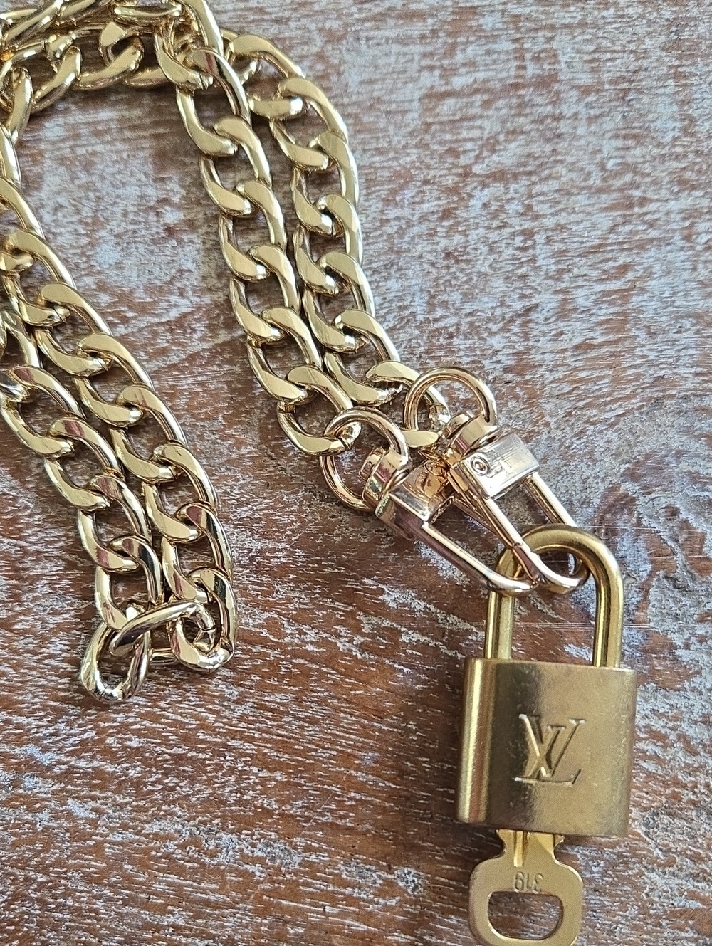 Authentic Louis Vuitton Lock & Key #319 on 18" Gold Tone Chain. (BIN 011)